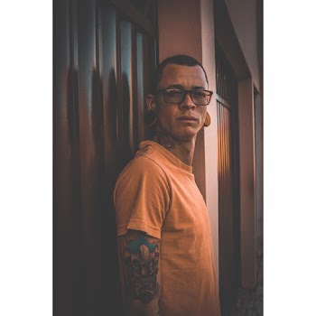 Man Wearing Orange Shirt