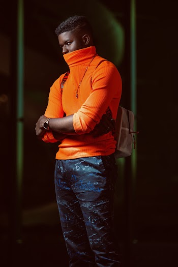 Man Wearing Orange Turtleneck Sweater