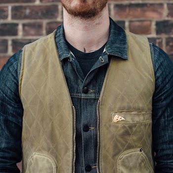 Man Wearing Pizza Lapel Pin
