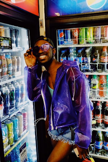 Man Wearing Purple Jacket