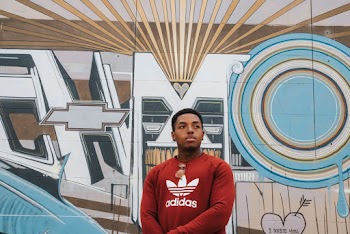 Man Wearing Red Adidas Crew-neck Sweater
