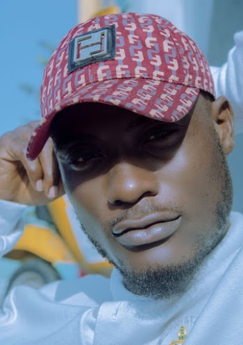 Man Wearing Red and Beige Fendi Baseball Cap