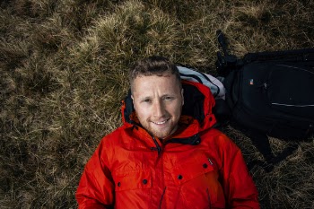 Man Wearing Red Bubble Jacket