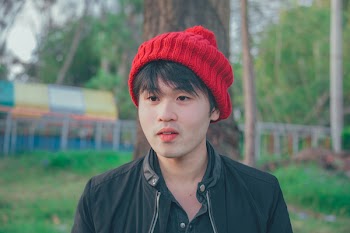 Man Wearing Red Knit Cap
