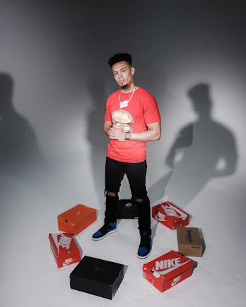 Man Wearing Red Shirt and Black Pants