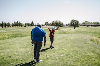Man Wearing Red Shirt Playing Golf