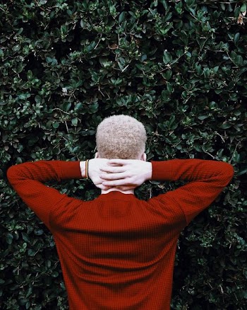 man wearing red sweatshirt