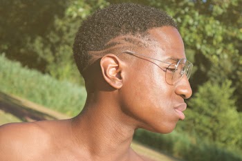 Man Wearing Silver-colored Framed Eyeglasses Outdoors