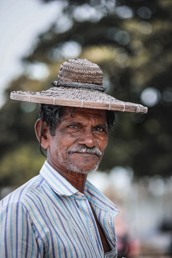 Man Wearing Straw Hat