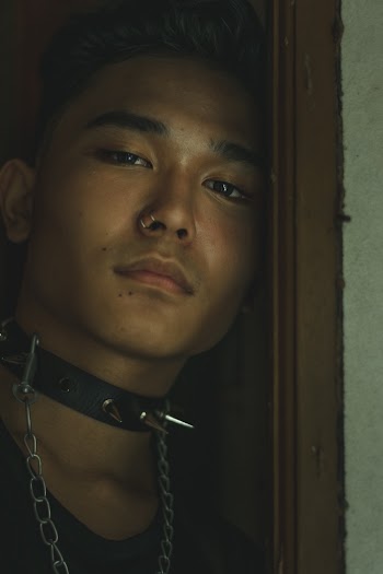 Man Wearing Stud Necklace