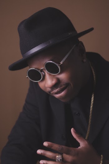 Man Wearing Sunglasses And Black Hat