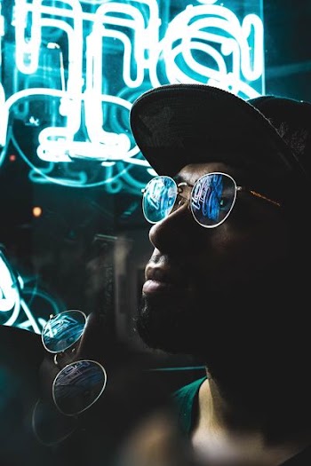 man wearing sunglasses with silver-colored frames