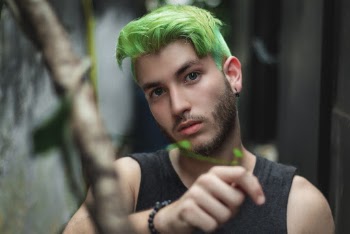 Man Wearing Tank Top With Green Hair