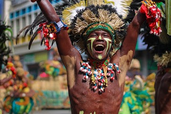 Man Wearing Traditional Costume in the Street
