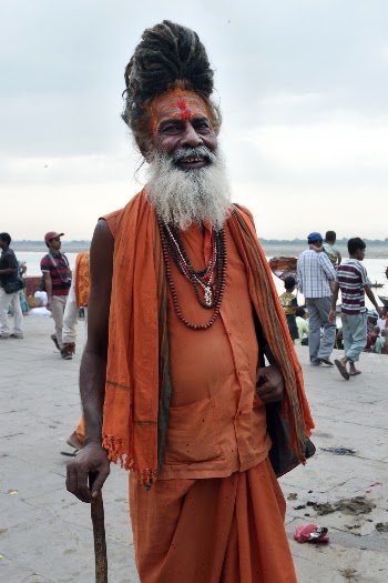 Man Wearing Turban and Orange Clothes