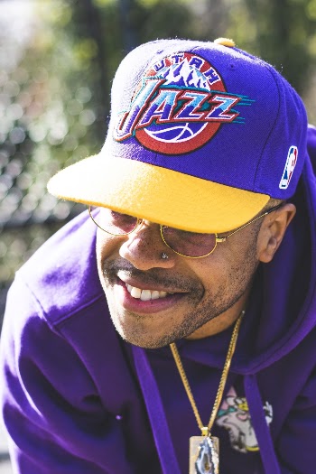 Man Wearing Utah Jazz Fitted Cap Smiling Outdoor