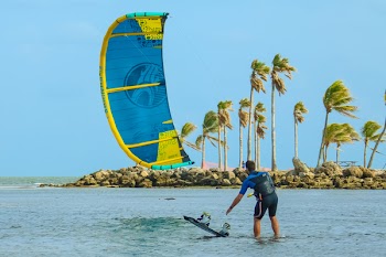 Man Wearing Wetsuit on Beach