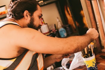 Man Wearing White and Black Tank Top