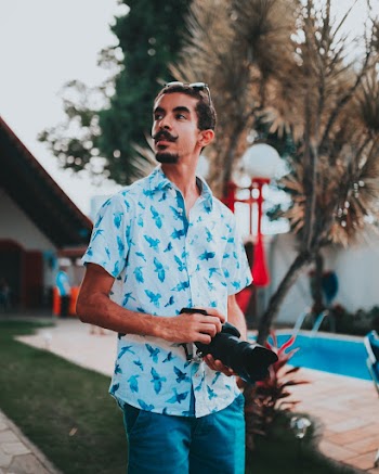 Man wearing White and Blue Button-up Shirt