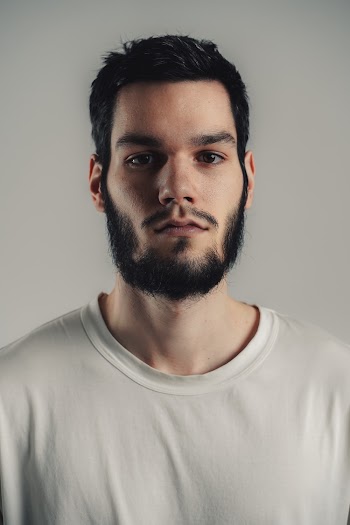 Man Wearing White Crew-neck Shirt