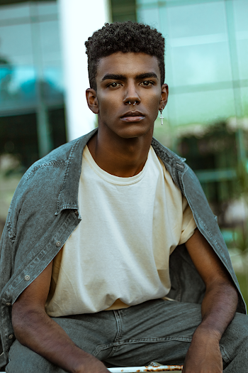 Man Wearing White Crew-neck Shirt And Grey Denim Button-up Jacket 