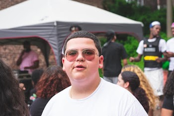 Man Wearing White Crew-neck Shirt and Sunglasses
