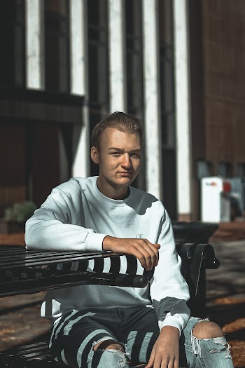 Man Wearing White Crew Neck Sweater