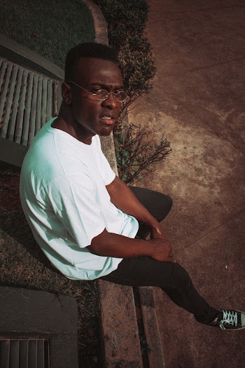 Man Wearing White Crew-neck T-shirt