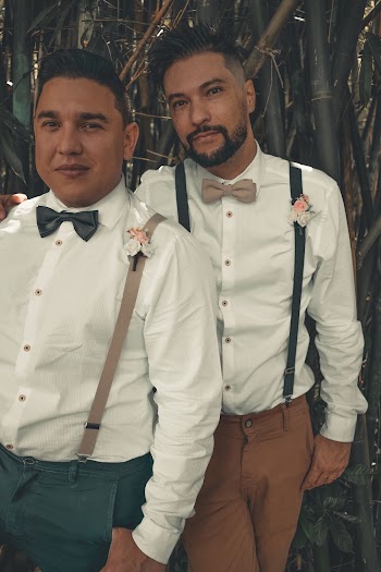 Man Wearing White Dress Shirt Beside Another Man