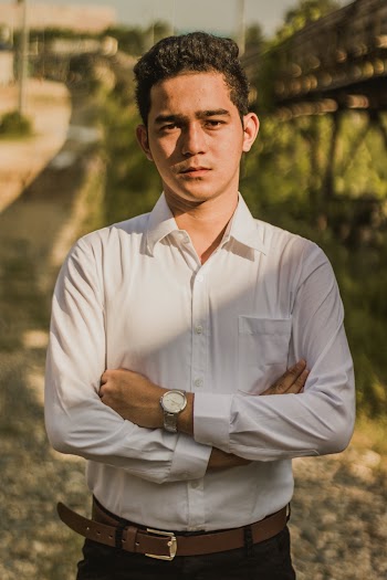 Man Wearing White Dress Shirt With Arms Crossed