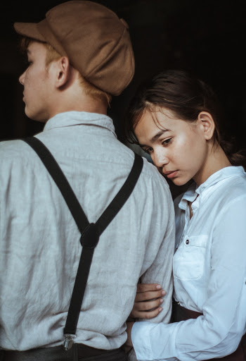 Man Wearing White Shirt Beside Woman