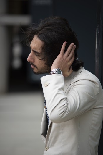 Man Wearing White Suit Jacket