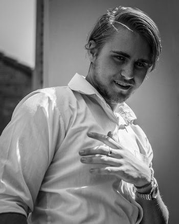 Man Wearing White Top