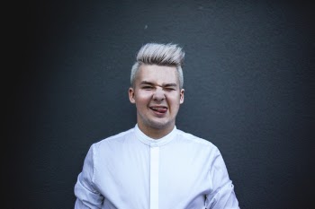 Man Wearing White Top