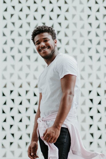 Man wearing white tshirt