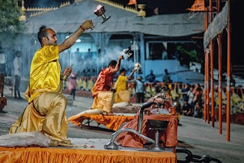 Man Wearing Yellow Outfit on Stage