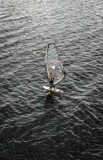 Man Windsurfing