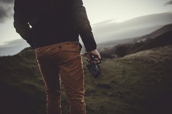 Man with a camera in Trapp, | Free Photo - rawpixel
