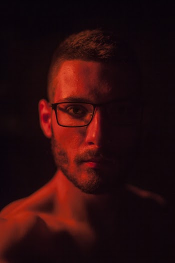 Man With Beard and Black Framed Eyeglasses