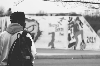 Man With Black Backpack