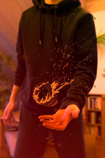 Man With Black Pullover Hoodie and Pants