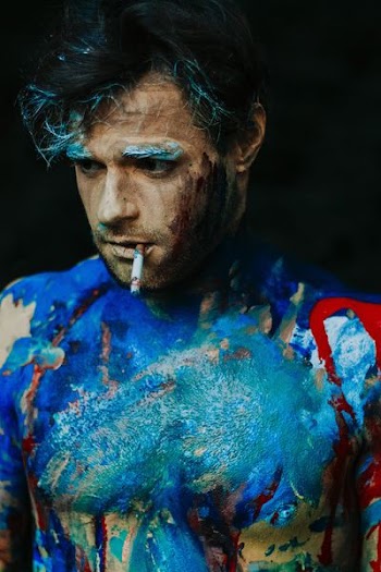 man with cigarette stick