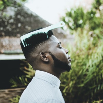 Man With Comb on His Hair