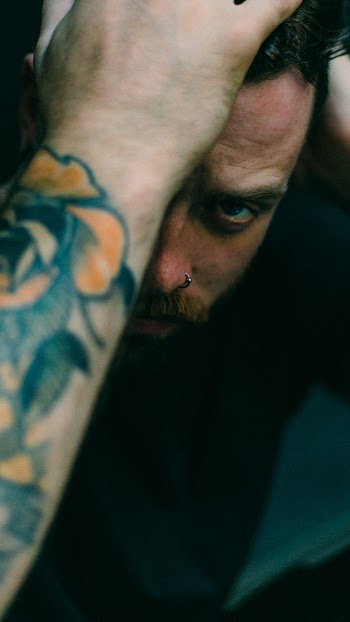 Man With Floral Tattoo