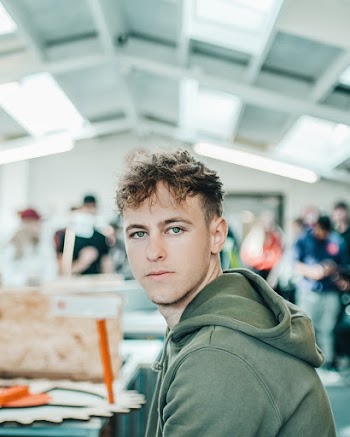 Man with Green Eyes Wearing Green Hoodie