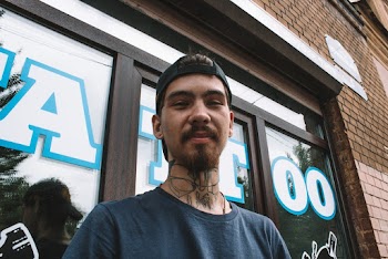 Man with Neck Tattoo