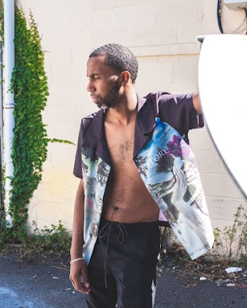 Man With Open-Shirt Standing on Focus Photography