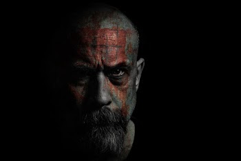 Man With Red Paint On Face