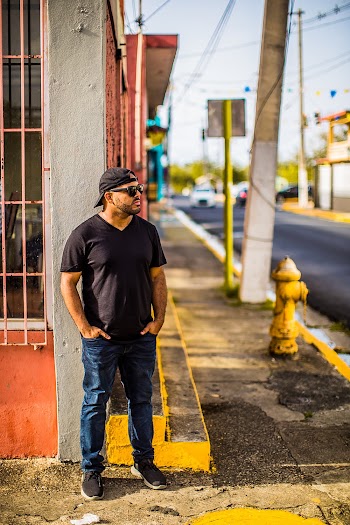 Man With Sunglasses In Casual Wear Standing On The Street Corner