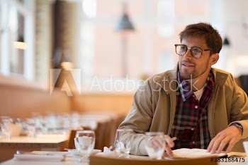 Man working in cafe
